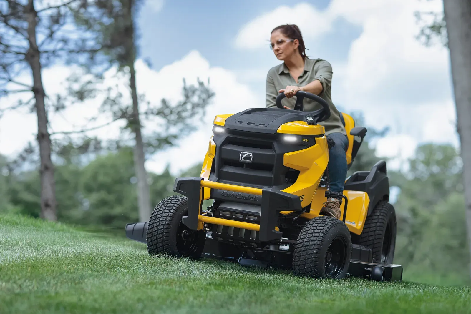 Cub Cadet XT2 GX54D lawn tractor, which has a differential lock, mowing up a grassy slope